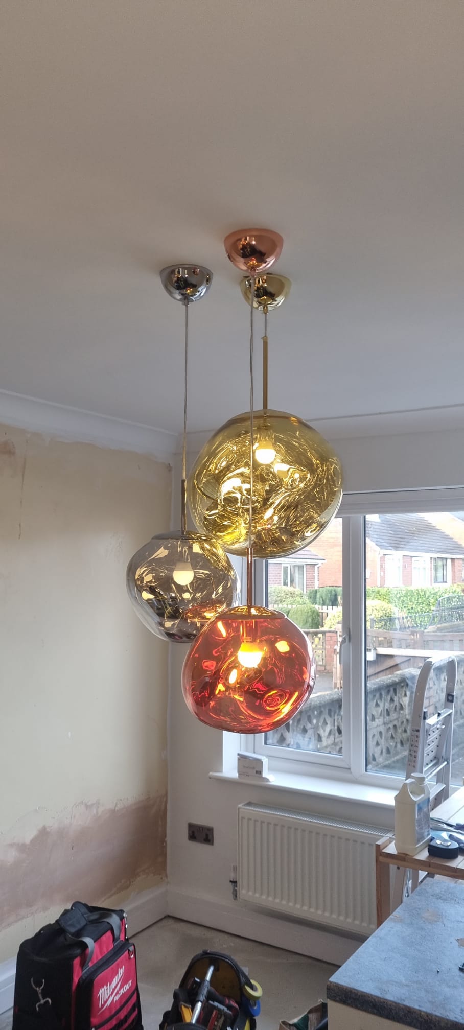 Decorative glass pendant lights installed by Brooke Electrical